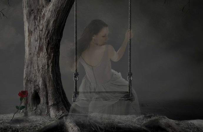 Otac i djeca fotografirali su duha na ljuljački